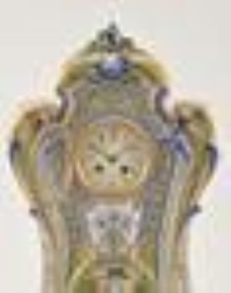 An extremely large and colorful French faience mantel clock
