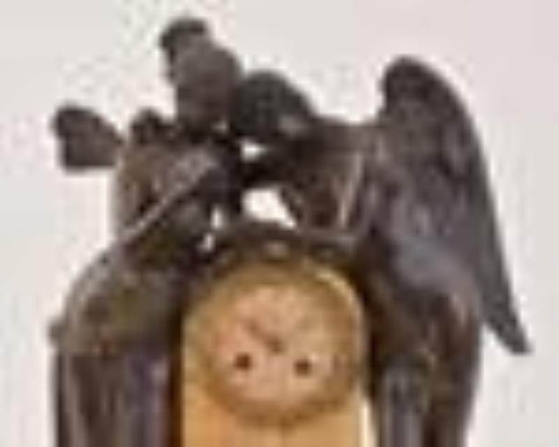 A mid 19th century French figural Cupid and Psyche mantel clock