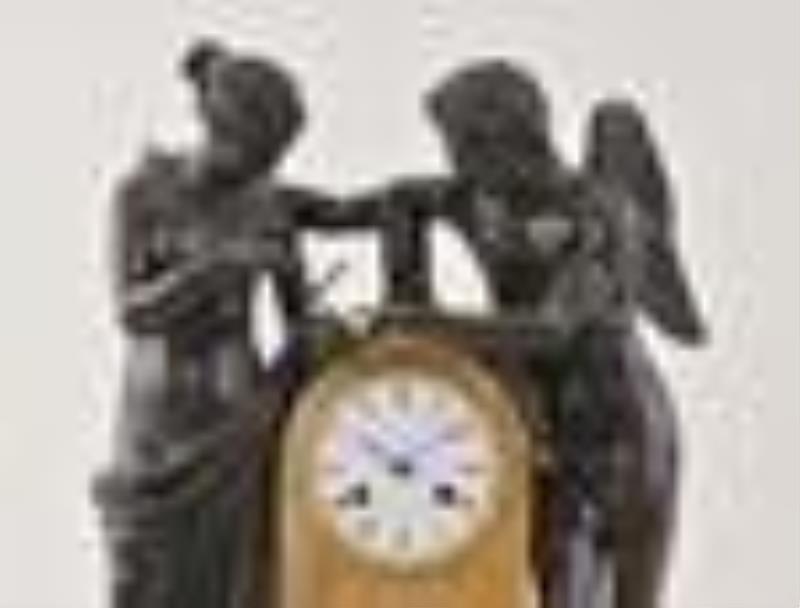 A good mid 19th century figural mantel clock featuring Cupid and Psyche