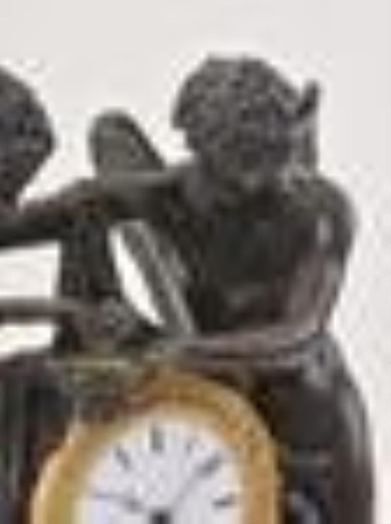 A good mid 19th century figural mantel clock featuring Cupid and Psyche