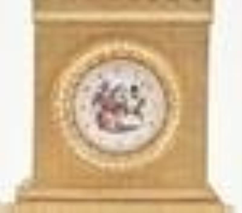A rare early 19th century gilt card stock and Dresden trim clock