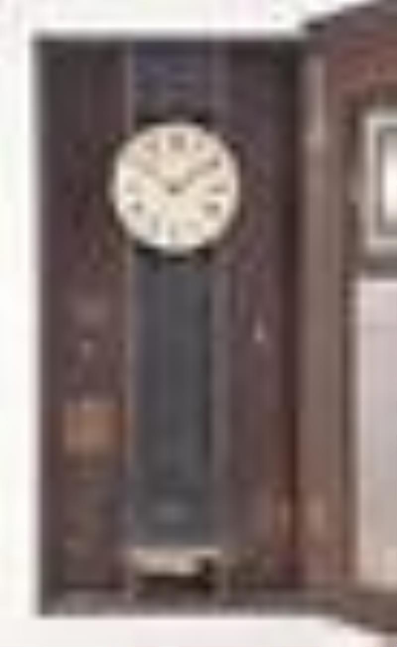 A 19th century New Hampshire mirror clock by James Cary Brunswick Maine