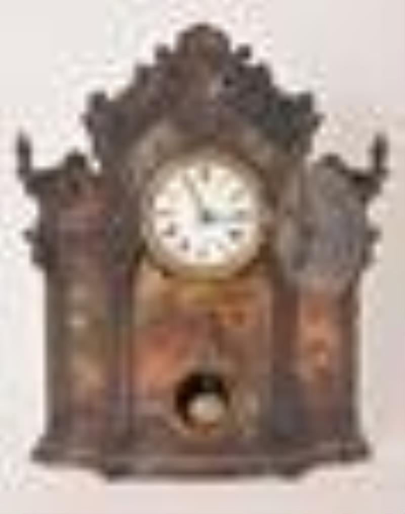 Paint decorated cast iron mantel clock.
