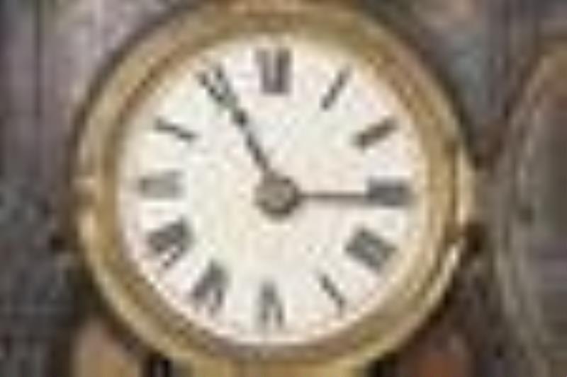 Paint decorated cast iron mantel clock.
