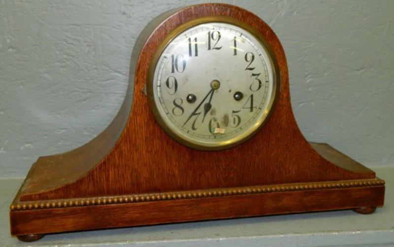 German golden oak 8 day clock w beaded detail.