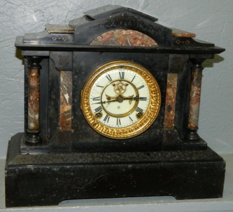 Ansonia marble shelf clock w/marble columns.