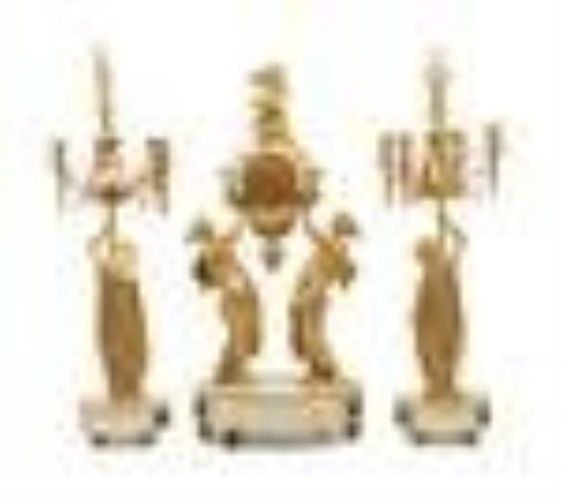 A Louis XVI Style Gilt Bronze and Marble Figural Clock Garniture