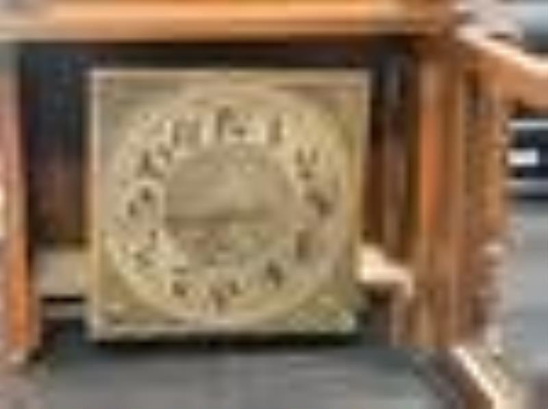 Carved oak German hall clock