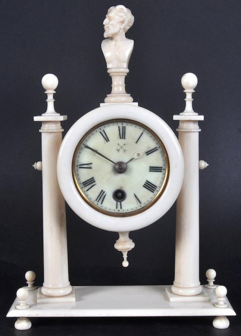 A RARE 19TH CENTURY EUROPEAN IVORY CLOCK, with column