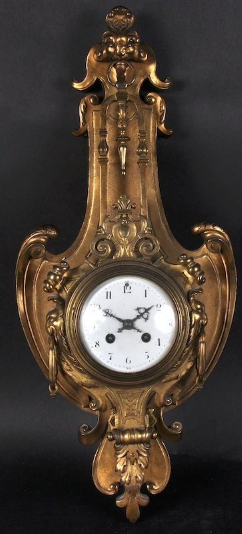 A 19TH CENTURY FRENCH ORMOLU CARTEL CLOCK, with lion