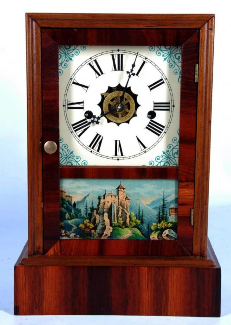 A CIRCA 1860 WATERBURY COTTAGE CLOCK