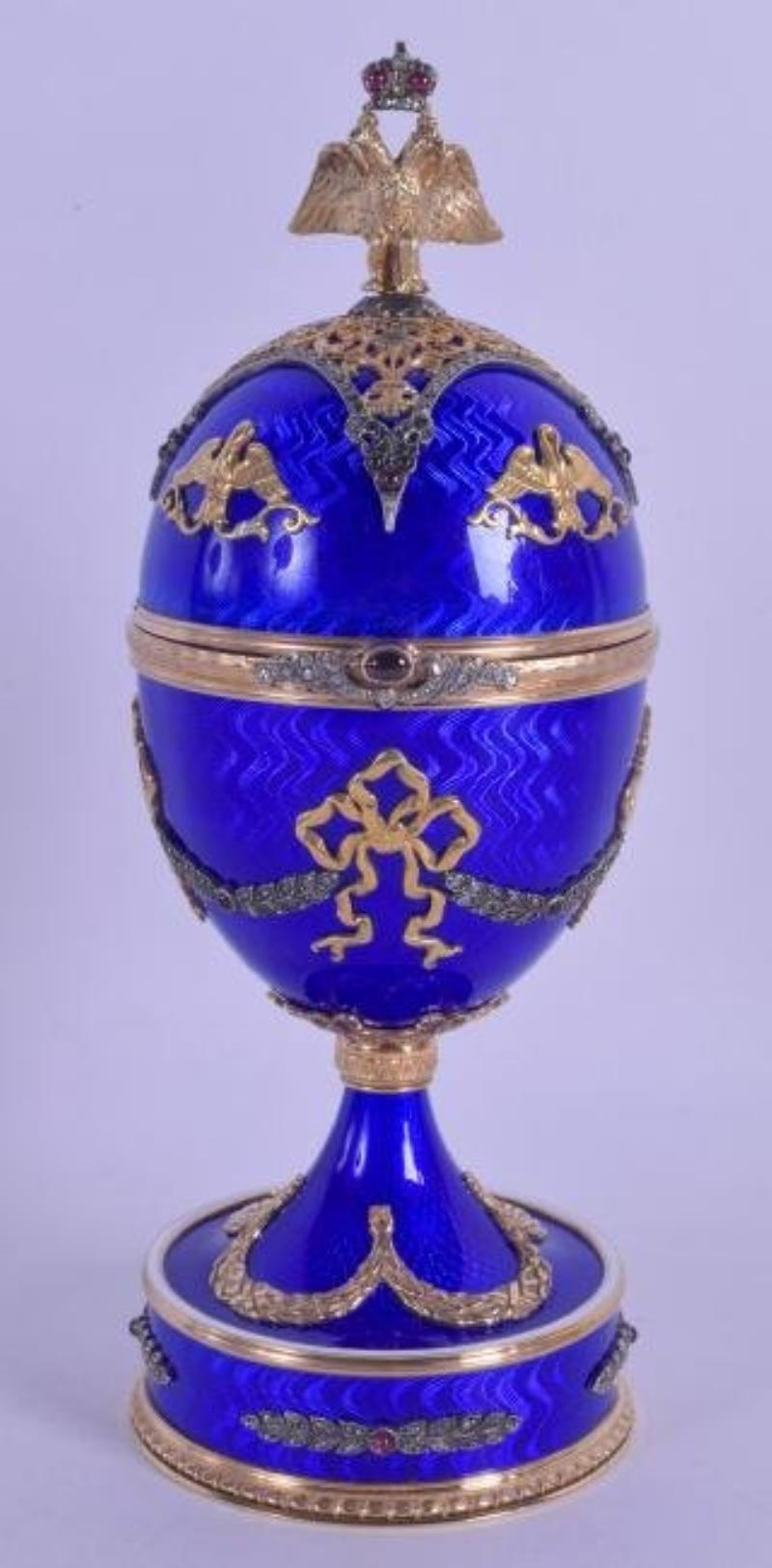 A FINE RUSSIAN SILVER GILT AND BLUE ENAMEL MANTEL CLOCK