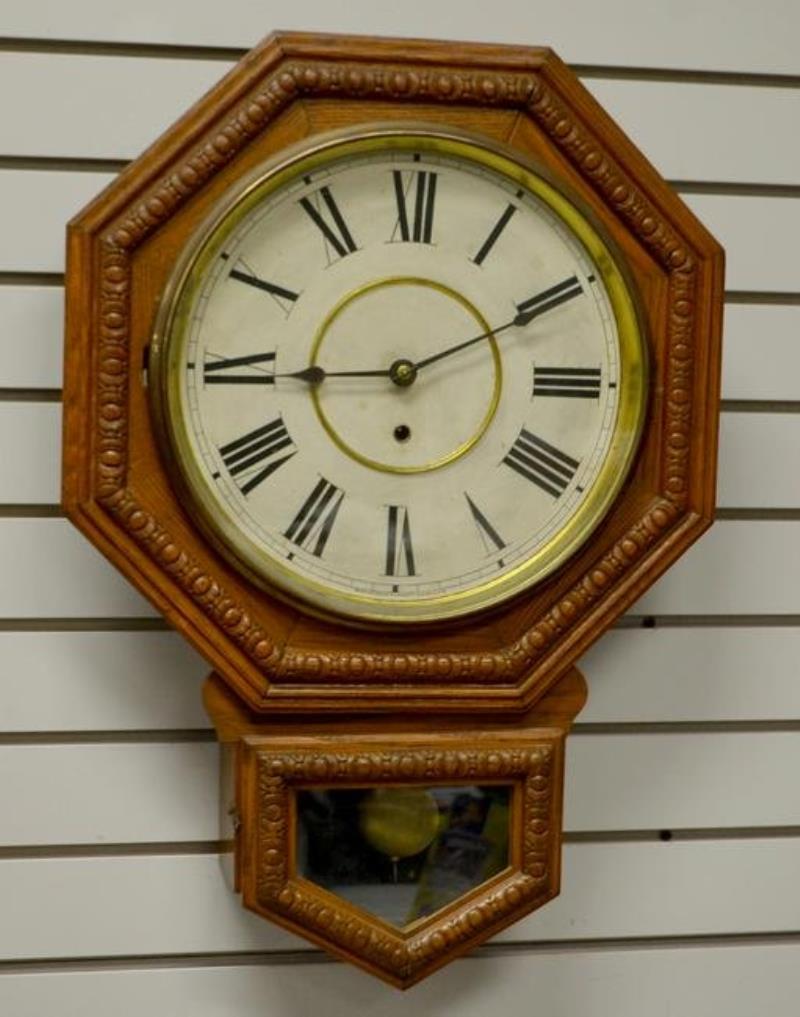 Waterbury Oak “Arion” Short Drop Clock. T/O, unsigned