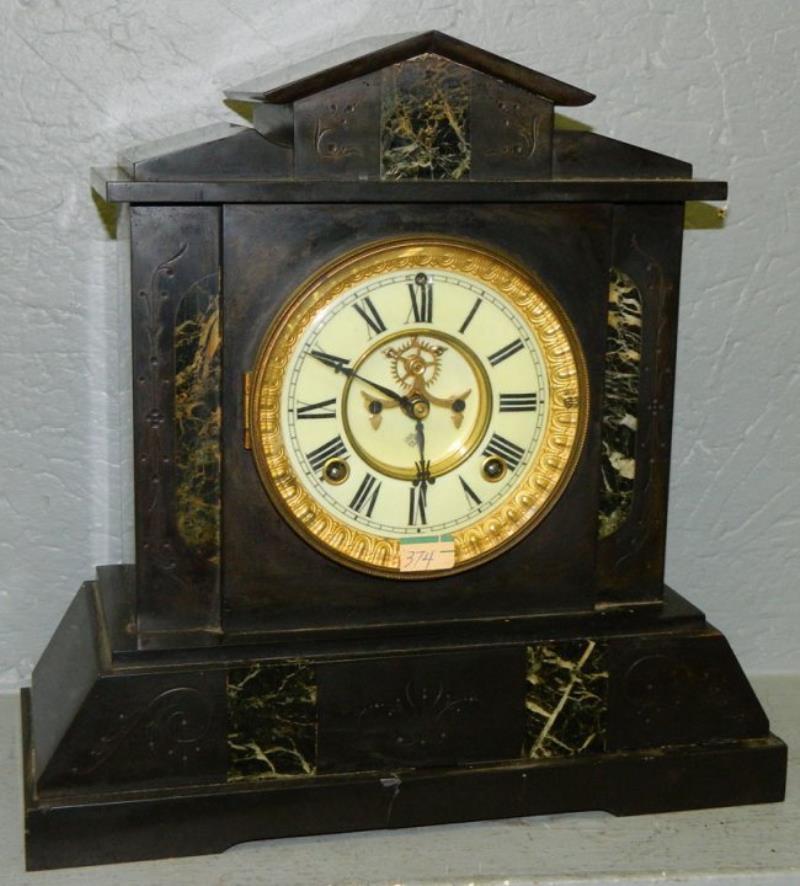 Ansonia marble 8 day clock w/gold etching.