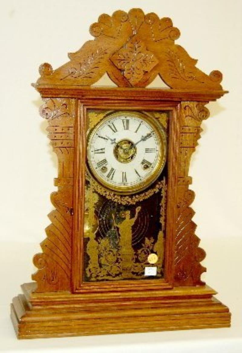 E.N. Welch Walnut “Marie Tempest” Kitchen Clock