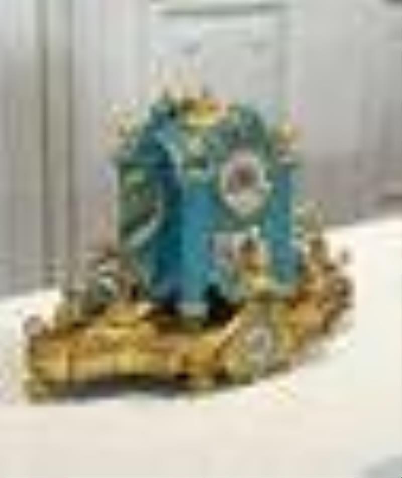 French Gilt Bronze And Porcelain Mantle Clock