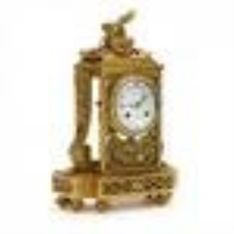 Raingo Frères, Gilt Bronze and Four Glass Mantel Clock