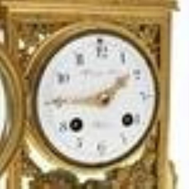 Raingo Frères, Gilt Bronze and Four Glass Mantel Clock
