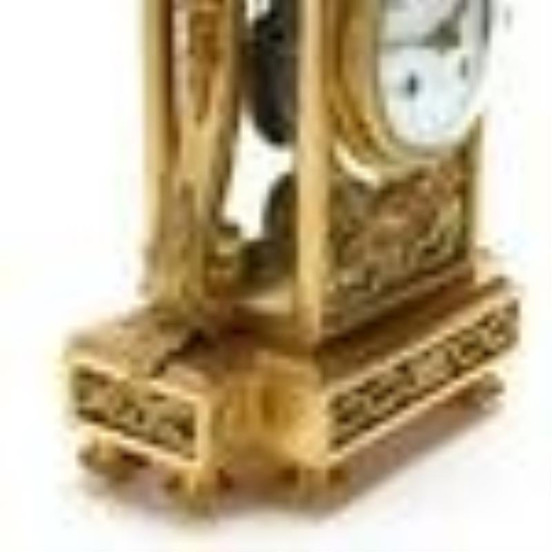 Raingo Frères, Gilt Bronze and Four Glass Mantel Clock