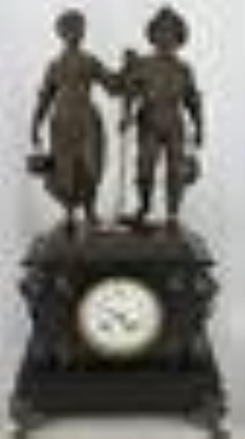 An Antique Marble & Spelter Clock Garniture Set.