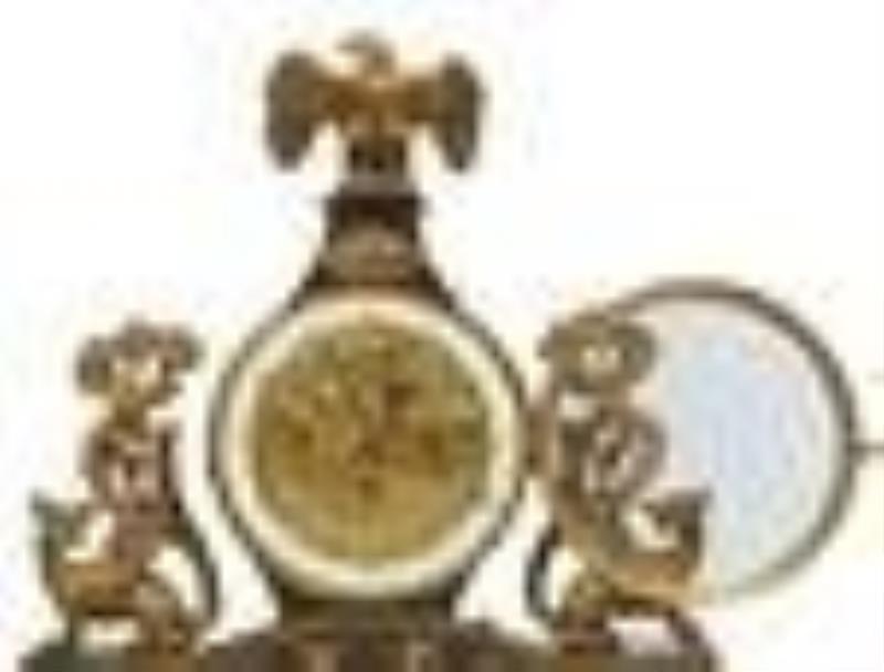 Rare Austrian Bronze Mounted Automaton Face Mantel Clock, late 19th c., with a gilt carved eagle