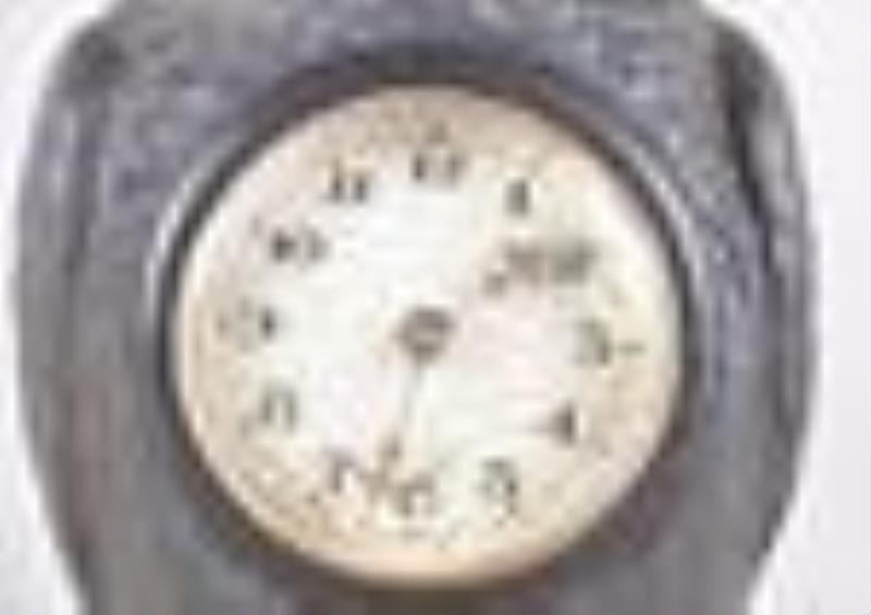 An early 20th century German owl form novelty clock