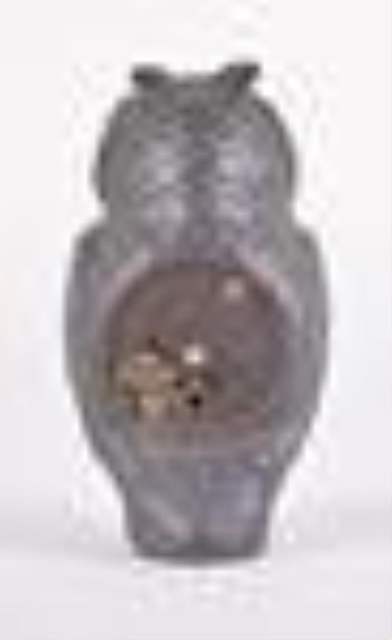 An early 20th century German owl form novelty clock