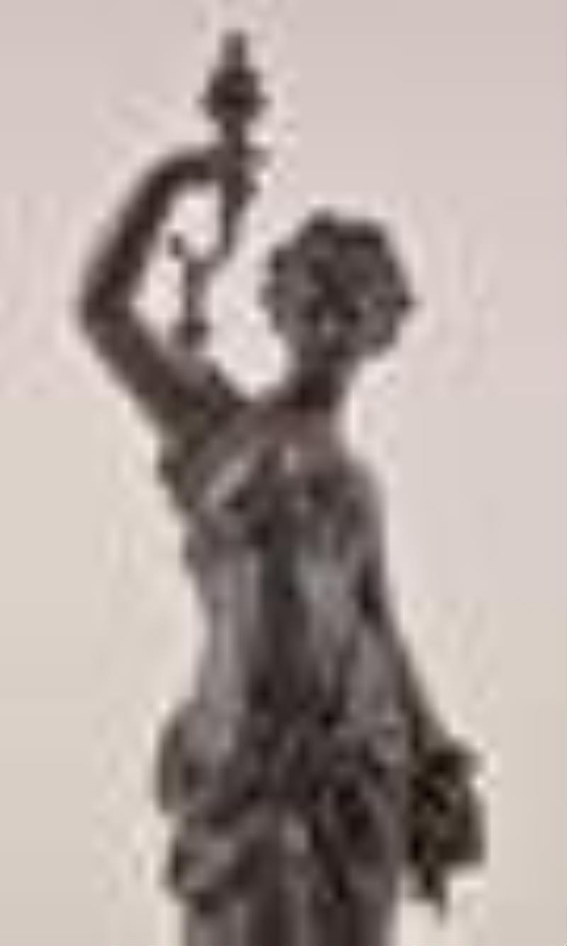 A 20th century French style figural clock with torsion pendulum