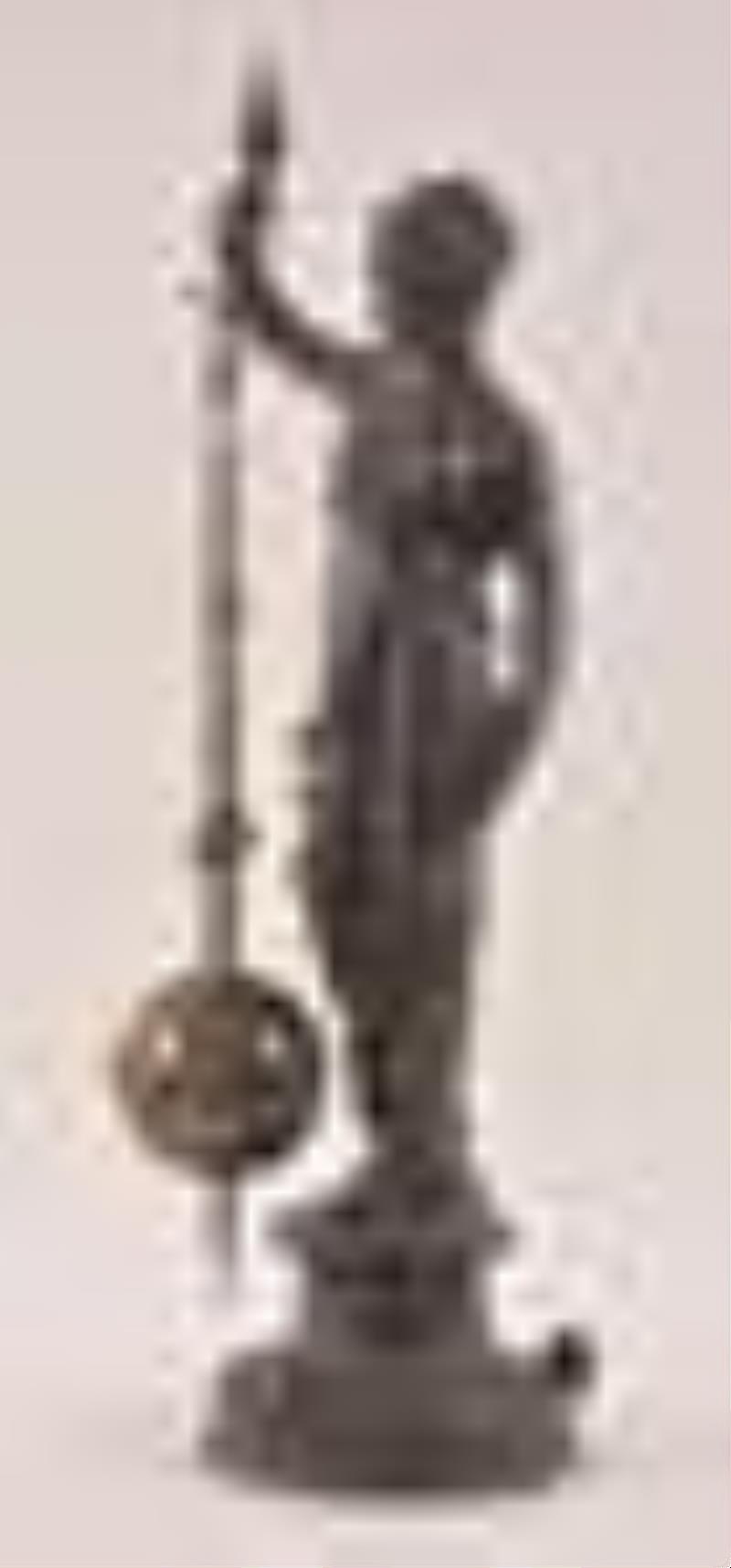 A 20th century French style figural clock with torsion pendulum