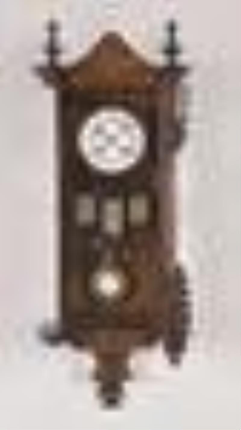 A late 19th century German hanging calendar clock