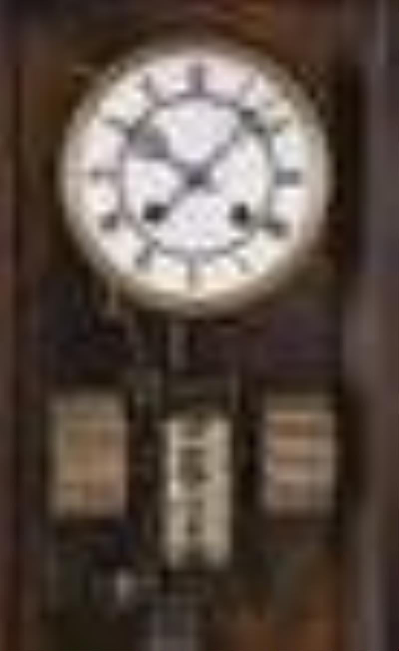 A late 19th century German hanging calendar clock