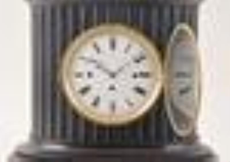 A mid 19th century quarter striking Austrian mantel clock with later dog automata