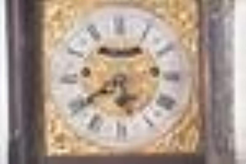 A later 18th century ebonized quarter striking bracket clock signed Michael Remred London