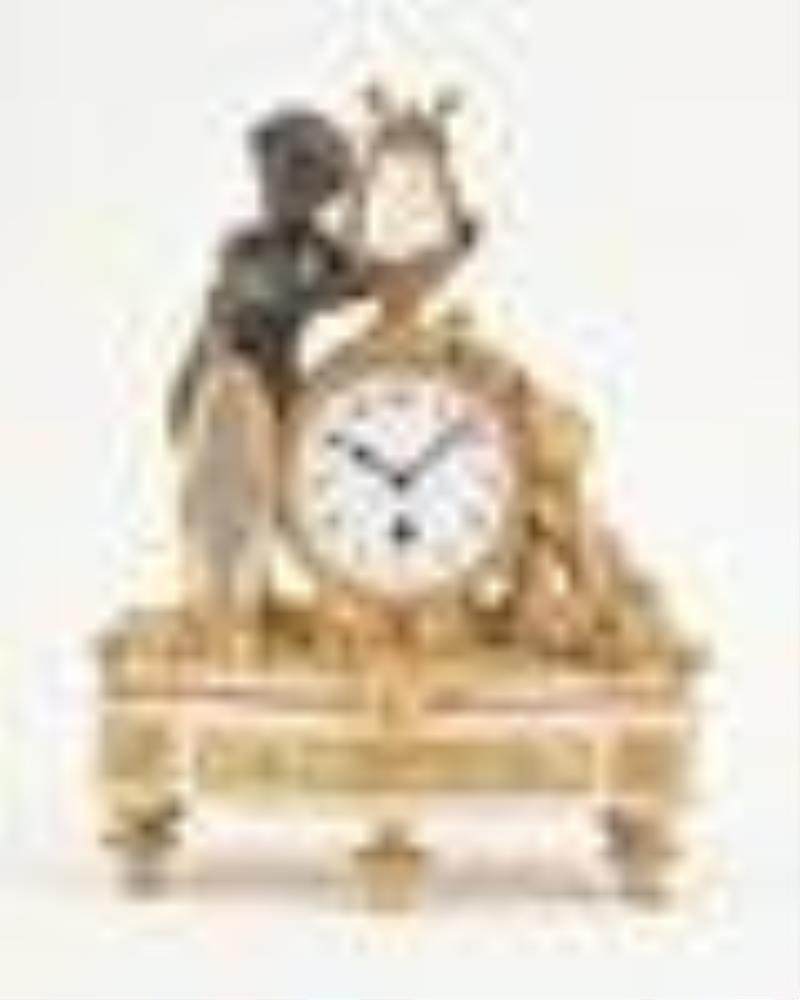 A French 20th century miniature three piece clock garniture signed Ch. Hour