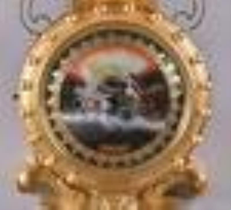 Foster Campos girandole wall clock.