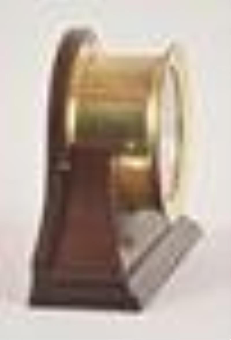 Chelsea Marine ships clock mounted on mahogany stand