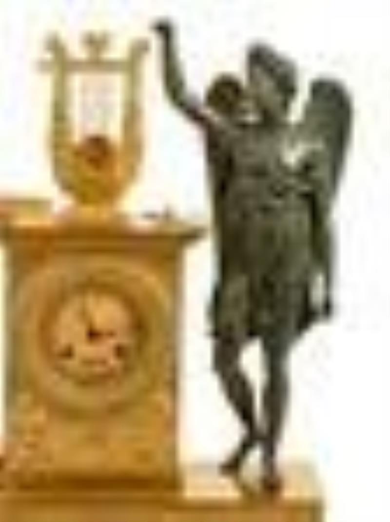 An Empire Gilt and Patinated Bronze Figural Mantel Clock