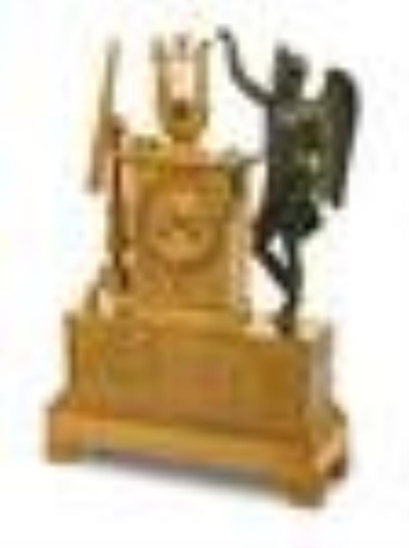 An Empire Gilt and Patinated Bronze Figural Mantel Clock