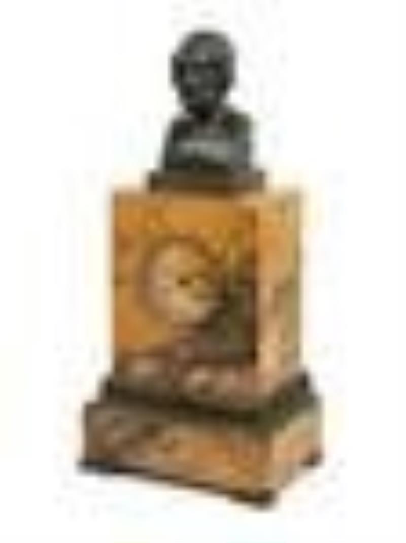 A Louis Philippe Bronze and Sienna Marble Mantel Clock