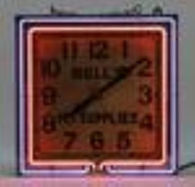 Bell’s Pet Supplies Neon Clock