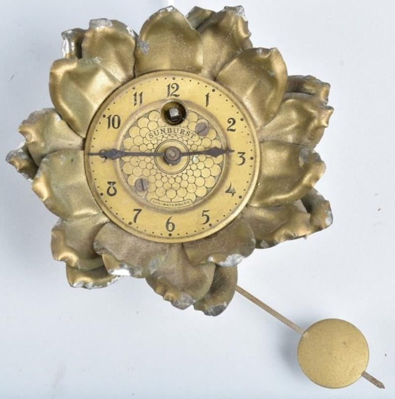 LUX SUNBURST FLOWER NOVELTY CLOCK