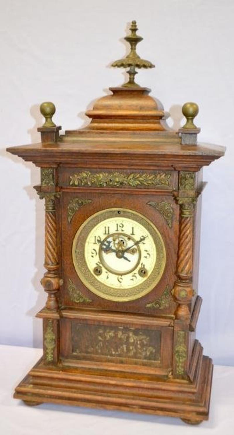 Ornate Wood & Metal Cabinet Clock. T&S, porcelain dial