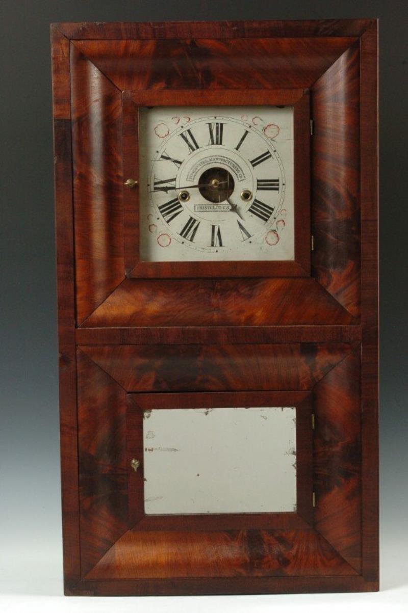 A FORESTVILLE TWO DOOR OGEE SHELF CLOCK 1849-1853