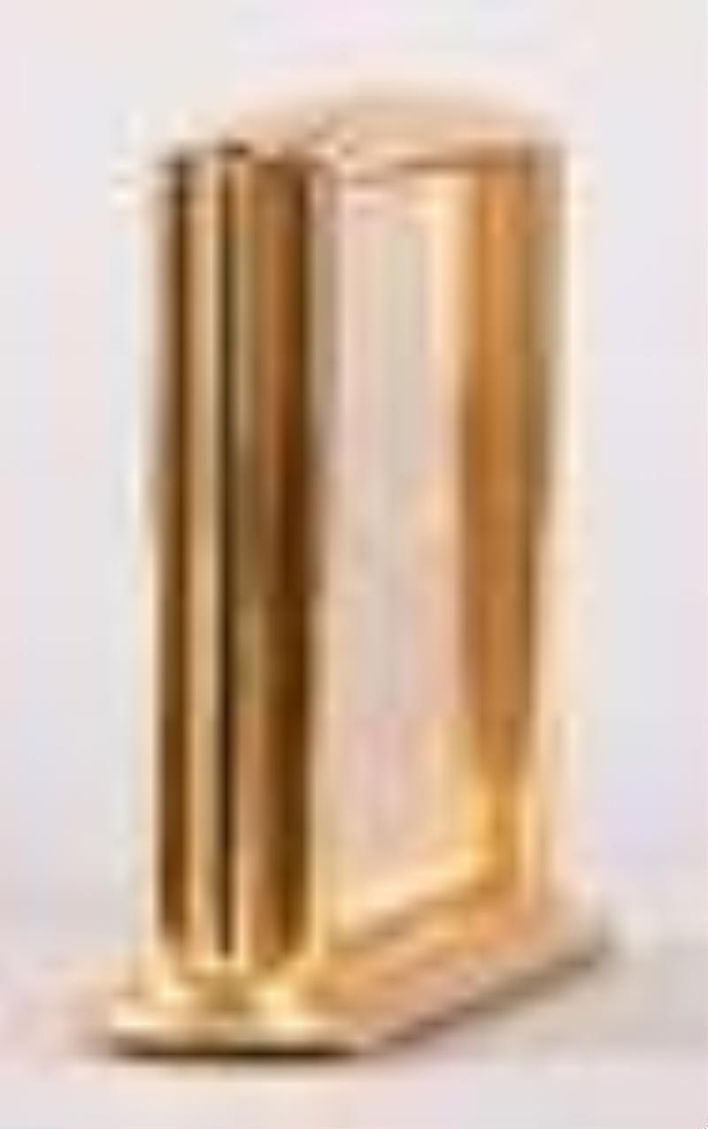 A good mid 20th century art deco style desk clock signed Gubelin