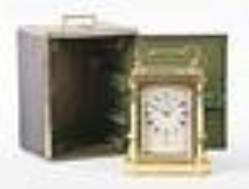 A good hour repeating carriage clock with brass bound wooden case signed James McCabe