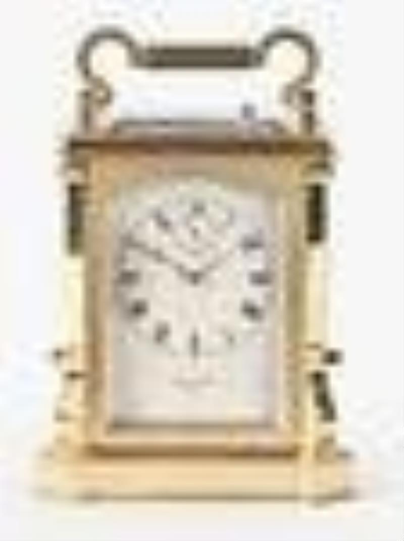 A good hour repeating carriage clock with brass bound wooden case signed James McCabe