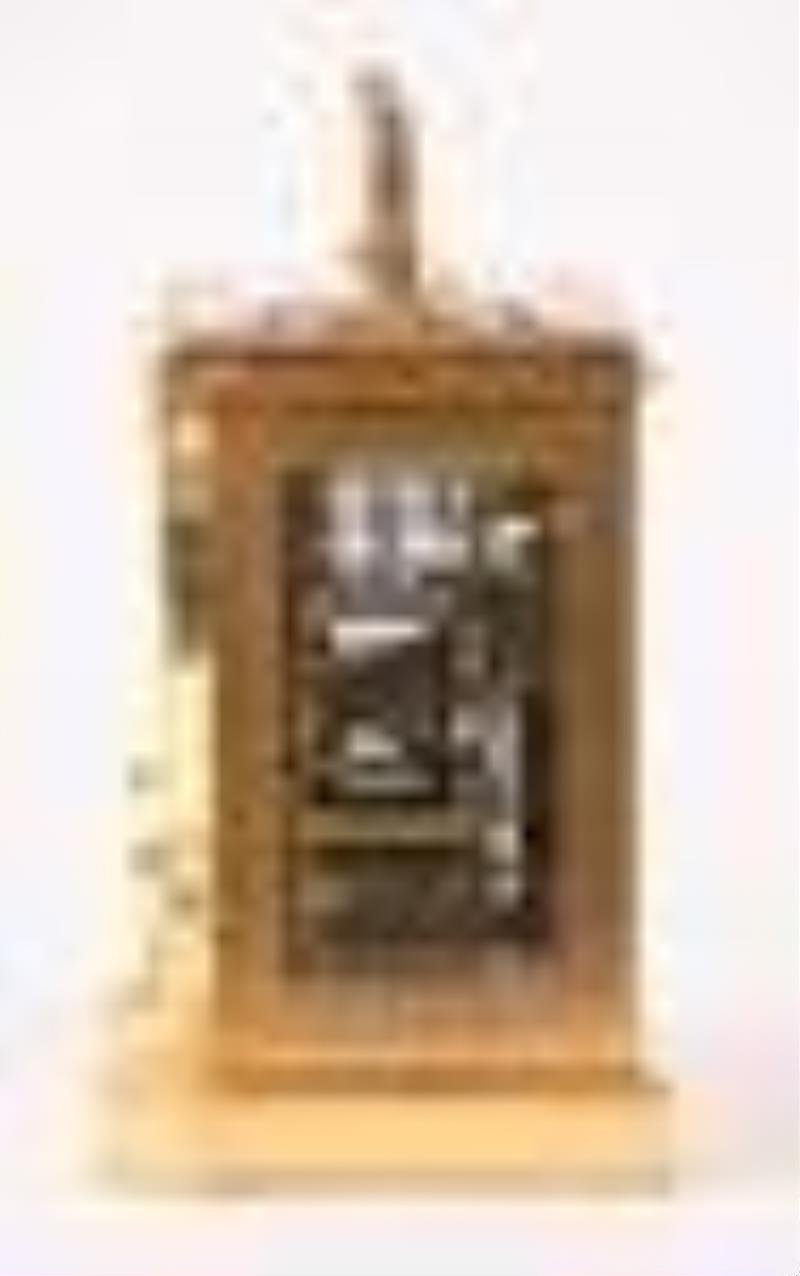 A good hour repeating carriage clock with brass bound wooden case signed James McCabe