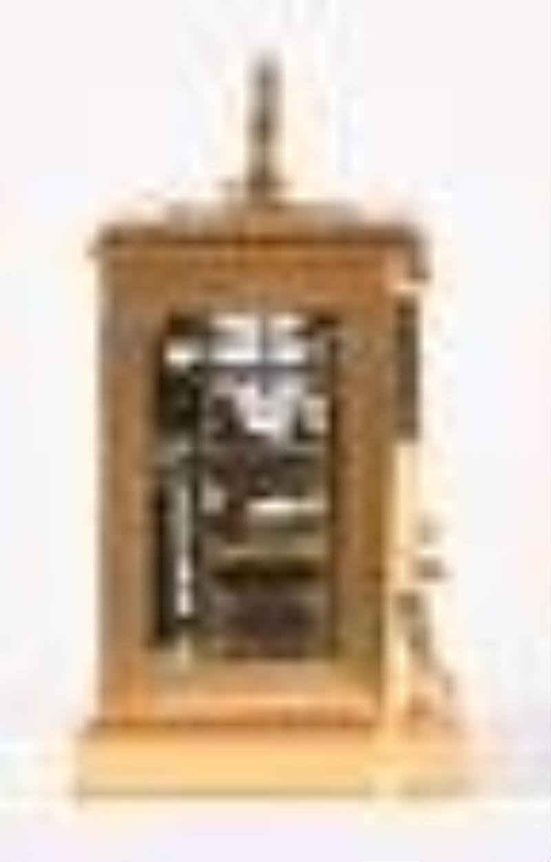 A good hour repeating carriage clock with brass bound wooden case signed James McCabe