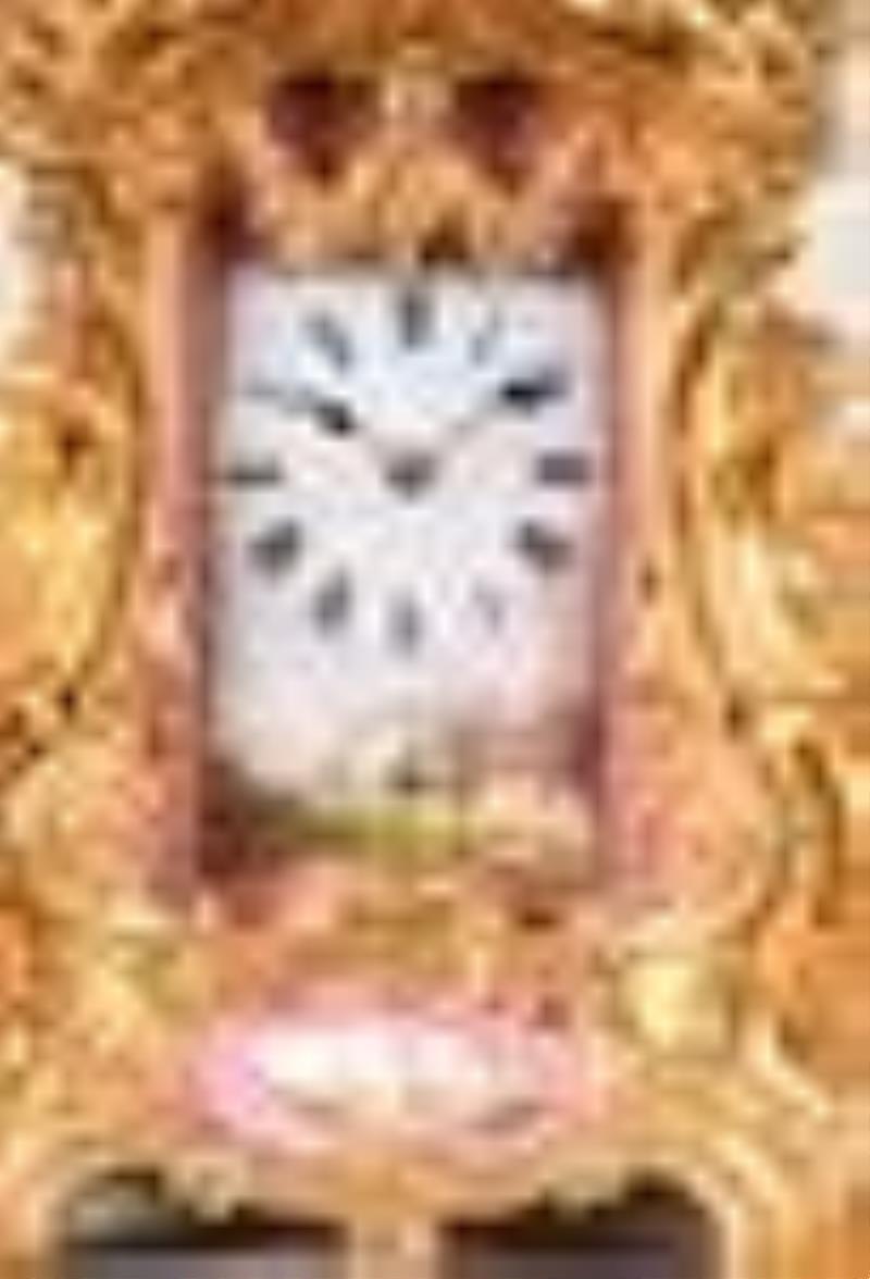 A good later 19th century rococo style enamel paneled carriage clock by Drocourt