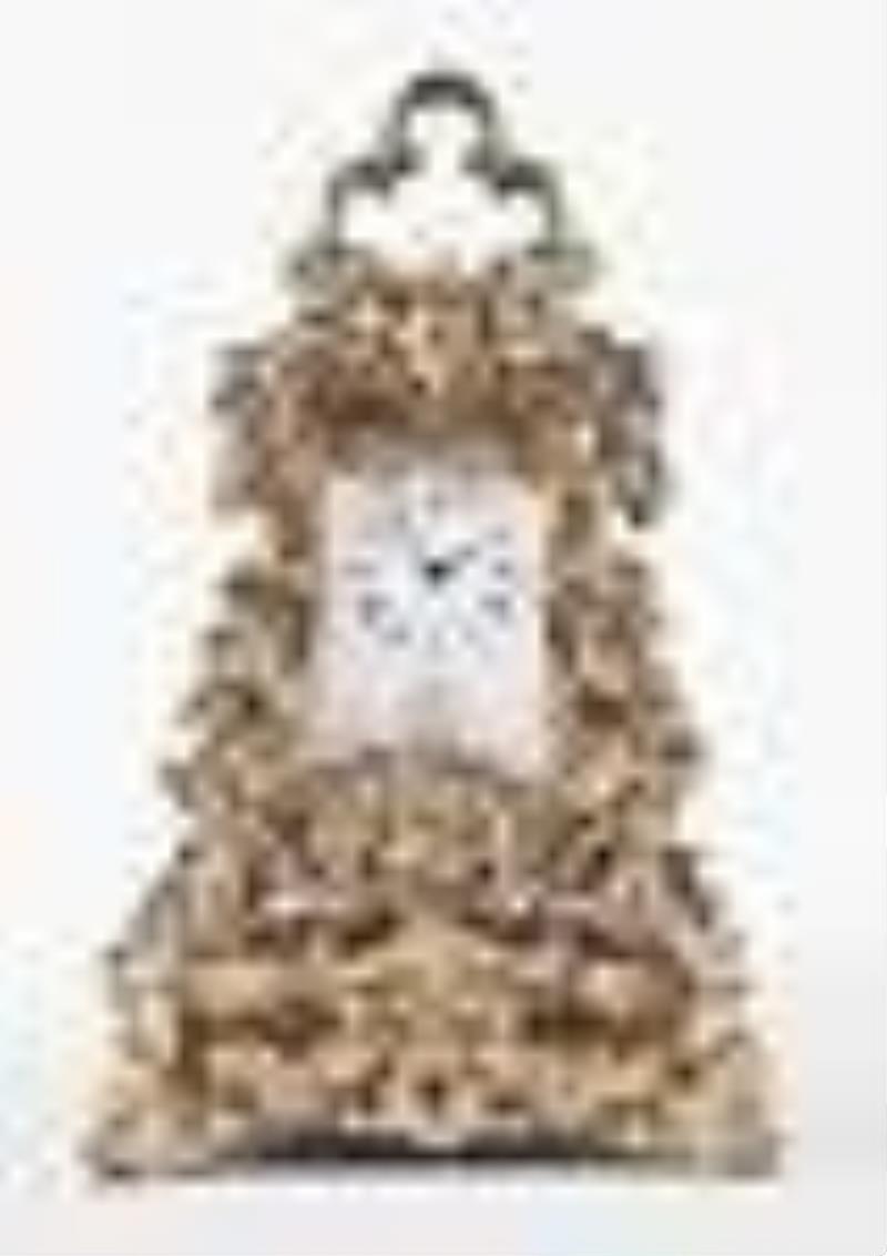 A large and extremely ornate rococo style repeating carriage clock with base signed Oudin